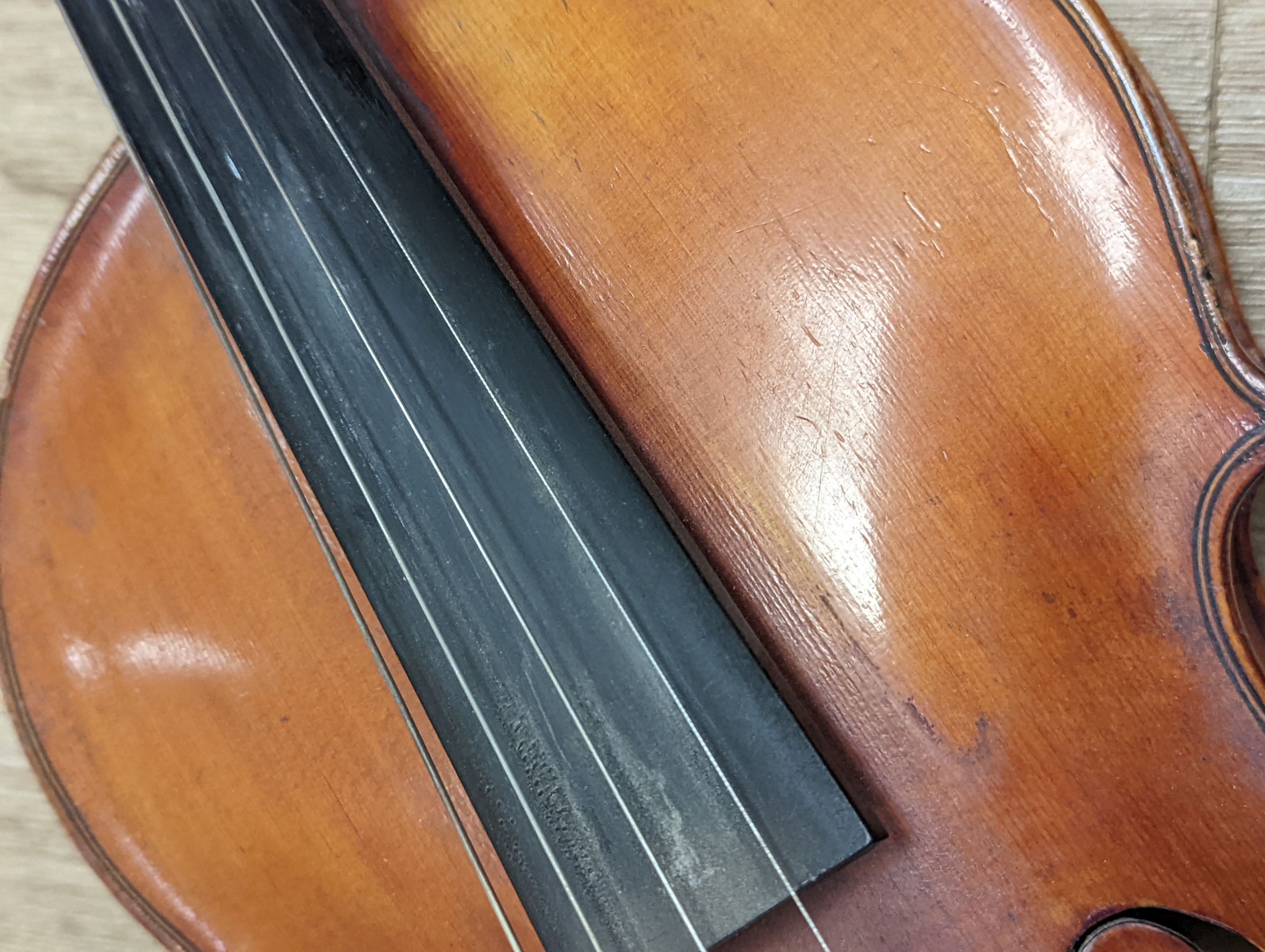 A Viola, assorted bows and a violin back